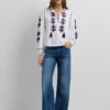 Blouse à broderies florales