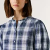 Blouse à carreaux avec volants