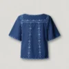 Blouse à col en V avec détails brodés