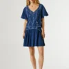 Blouse à col en V avec détails brodés