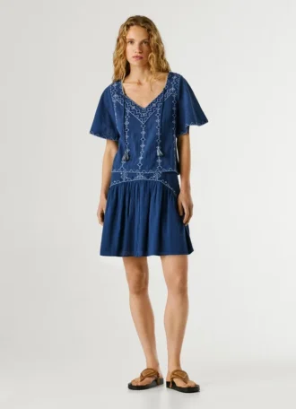 Blouse à col en V avec détails brodés