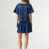 Blouse à col en V avec détails brodés