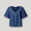 Blouse à col en V avec détails brodés