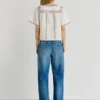 Blouse à col en V brodée
