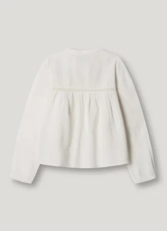 Blouse à détails brodés