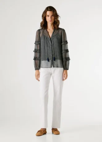 Blouse semi-transparente à volants