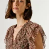 Blouse à volants et col en V Blouse à volants et col en V