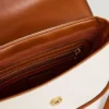 Sac à bandoulière combiné avec rabat