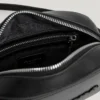 Sac à bandoulière effet cuir avec logo